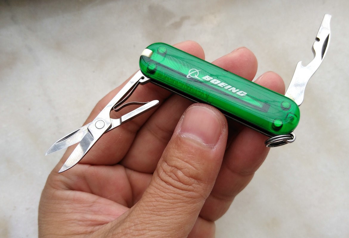 Bladeless with transparent emerald scales and Boeing branding