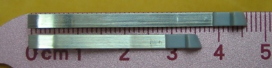 Short-Tweezers next to Regular 91mm Size