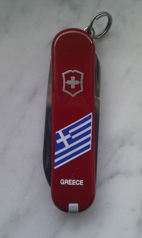 Red Classic SD - Greece, this one has the "Victorinox Swiss Made Stainless" inscription and a stamped shield