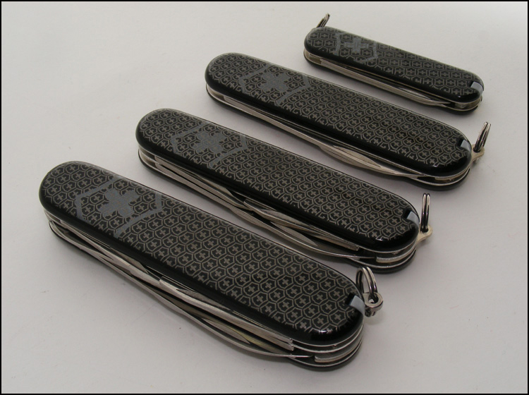 All 4 knives sold as the Logo Series LTD in South Africa: 91mm Climber, 84mm Tinker, 84mm Waiter, 58mm Classic SD