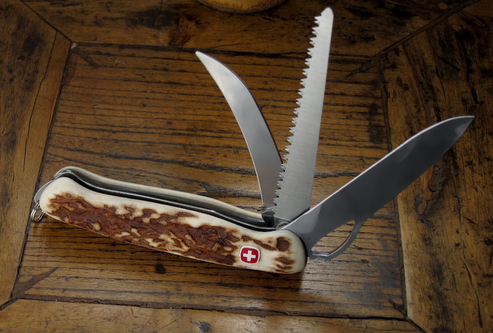 A custom Wenger Stag Hunter knife similar to the New Ranger 50 model, except it has no back-side tools.  This custom model was made exclusively for the German company Etuifertigung Mittweida, but it is unknown if they or a 3rd-Party manufactured the Stag handles and assembled the knifemanufactured and attached in Germa.  This knife was purchased in 2012.