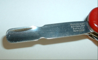 This Manicure Tool/Cuticle Pusher is only found on a few Vic 58mm classic knives.