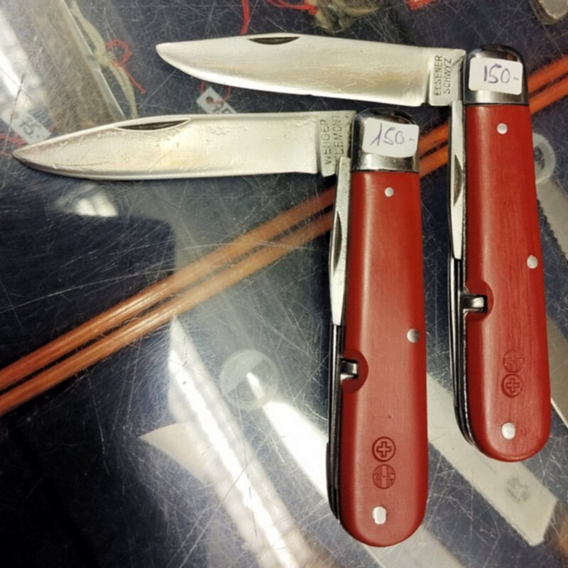 Fig.  4. WK and repair marks on Model 1908 Victorinox and Wenger knives
